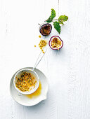 Passionfruit seeds in a sieve