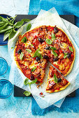 Chorizo, salami and olive pizza