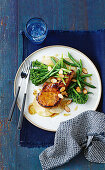 Sticky hoisin pork chops with broccolini and nashi salad