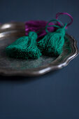 Hand-made green tassels