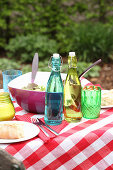 Bread, salad and drinks for a barbecue party