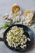 Popcorn with chilli, ginger, garlic and lime