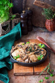 Chicken in a creamy sauce with mushrooms and herbs
