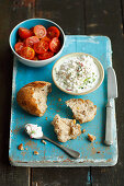 Roll, cottage cheese with red radishes and scallion, cherry tomatoes