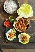Salad bowls with grilled pork, chili and spring onion