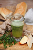 Ginger cocktail with wild herbs and pears