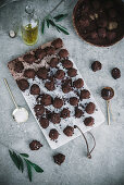 Homemade chocolate truffles with cocoa powder and olive oil