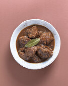 Beef ragout with a bay leaf