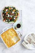 Warm honey-roasted pumpkin, silverbeet and currant salad, mashed potato and chive bake