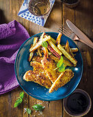 Hähnchenschnitzel mit Süsskartoffelpommes