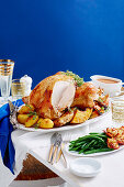 Roast turkey with bacon and herb stuffing