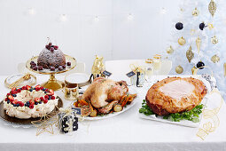 Orange and dark chocolate christmas pudding, Pavolva wreath, Roast turkey with cranberry and macadamia stuffing