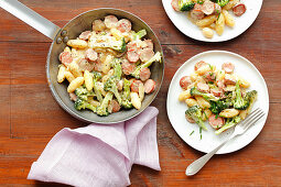 Gnocchi with sausage and broccoli in mustard sauce