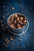 Roasted and sliced hazelnuts in the basket