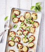 Mini courgette pizzas on a baking tray (low carb)