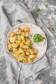 Indian style pan fried potatoes served with cilantro