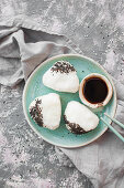 Onigiri with wasabi and avocado, served with soy sauce, Japanese rice sandwich