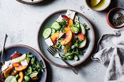 Cucamelons, peaches, cucumber, ricotta cheese and purslane salad