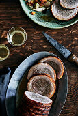 Pork roulade filled with sausage, Brussels sprouts and butternut squash