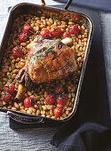 Slow-roasted lamb with white beans