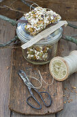A muesli bar with pistachios, sunflower seeds and sesame seeds for gifting