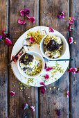 Brownie and pistachio ice cream in small bowls