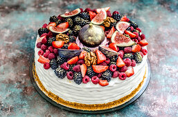 Honey cake with summer berries: ruspberry, strawberry, blackberry, blueberry, figs