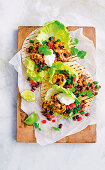 Spicy prawn tacos with bean salad
