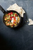 Scrambled egg curry with tomato salsa