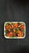 Smoky BBQ drumsticks and carrot noodle salad