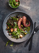 Octopus with lentils, olives and herbs