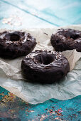 Vegan doughnuts with a dark chocolate glaze