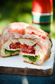 Sandwich cake with chicken, bacon and tomato