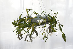 Wreath of mistletoe decorated with pastry cutters