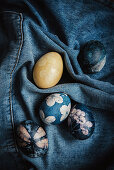 Easter eggs dyed with natural colours and decorated with flowers