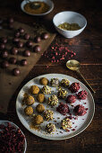 Homemade sea buckthorn, pistachio and cherry truffles