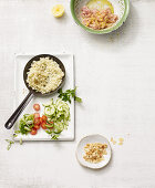 Ingredients for tabbouleh made from cauliflower with cucumber and chicken breast (no carb)