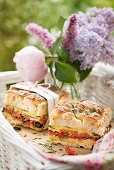 Stuffed focaccia with courgette, tomatoes and olives for summer picnic