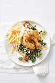 Grilled chicken with kale gratin and french fries