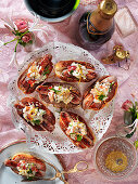 Hot dogs with lobster and lemon zest for a New Year's Eve party