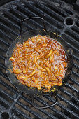 Grilled onions with barbecue sauce
