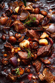 Braised beef cubes with onions and mushrooms