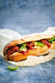 A sub sandwich with meatballs