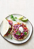 Spicy steak tacos with smashed kidney beans