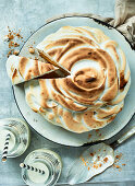 An orange and almond cake with a meringue topping
