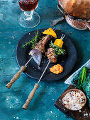 Fondue with beef, pumpkin, kale and salsa