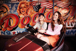 Two girls in a bumper car