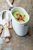 Courgette soup with bacon chips to take away