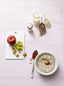 Ingredients for a breakfast bowl with grapes and apples