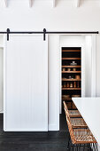 Pantry with white sliding door